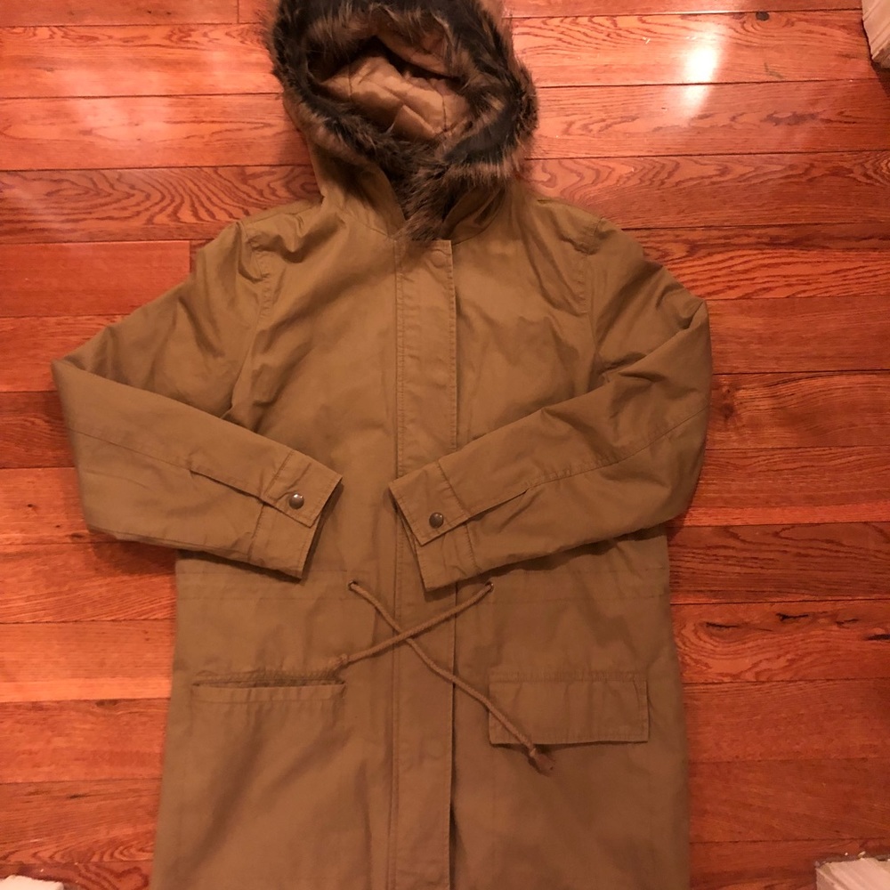 Beige jacket. Fur on the hood can be removed NWOT